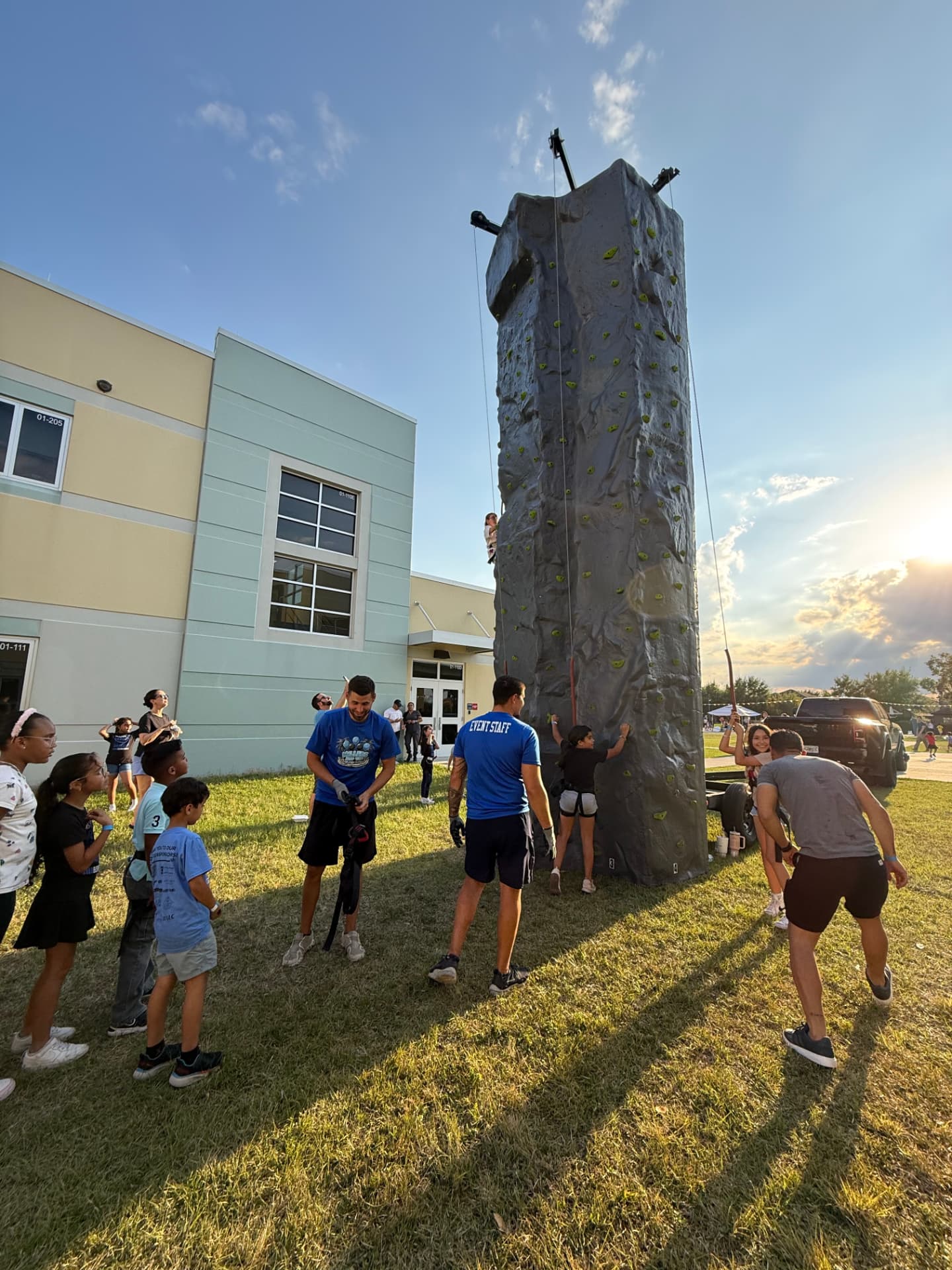 A school event day with Bounce Hype inflatables and supervising staff