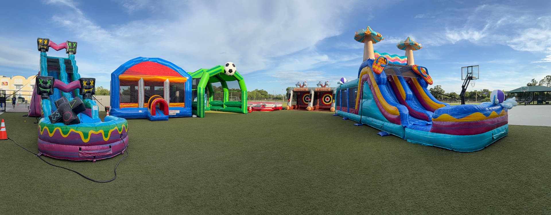 Students lined up at a Bounce Hype inflatable during a school event