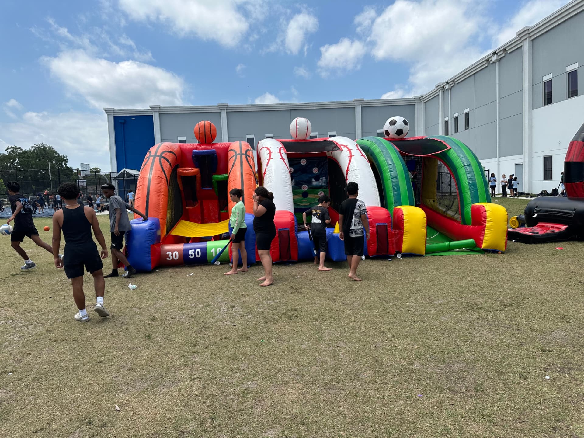 Millers Jump Time Entertainment crew running a school event